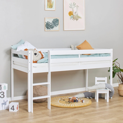 White children's loft bed with bedding in a room with toys and decor.