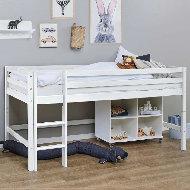 White loft bed with shelves in a child's room