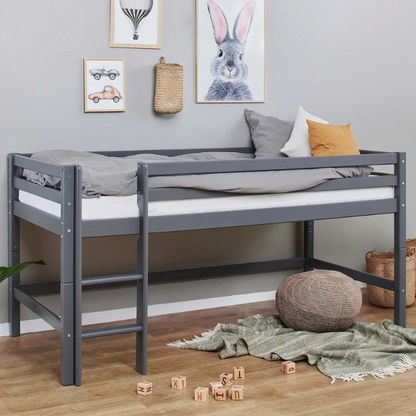 Smoked Pearl dark grey bunk bed in a room with a wooden floor and decorative items on the wall.