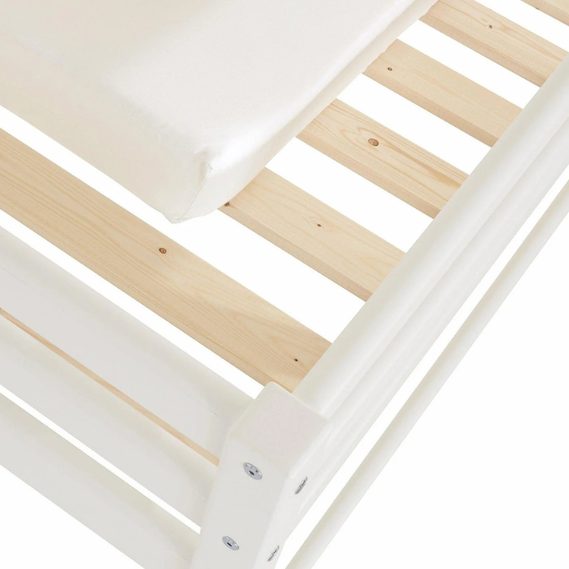 Wooden bed frame with white mattress on a white background