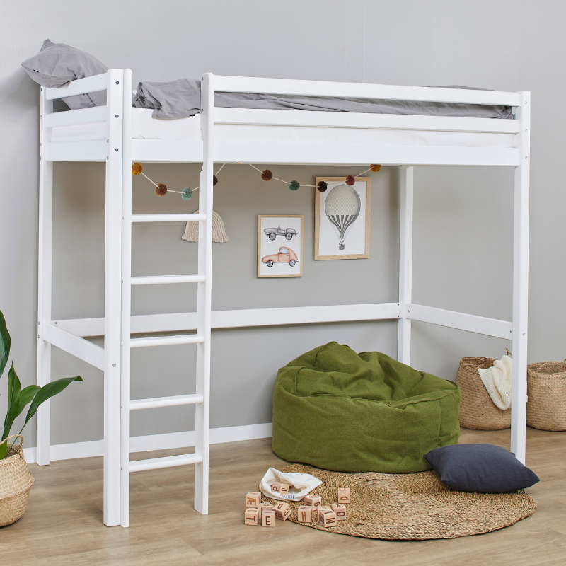White loft bed with green bean bag and toys in a room with gray walls and wooden floor.