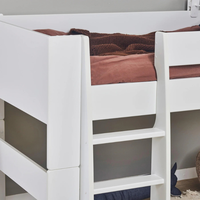 White loft bed with brown bedding in a room setting