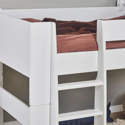 White loft bed with brown bedding in a room setting